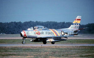 North American F-86F-35-NA Sabre Serial 52-5222 of the 72d Fighter-Bomber Squadron.  The aircraft has been restored and is painted in the Wing Commander's motif, with blue, yellow and red striping.  It is presently in private hands as civil registration N86FS.